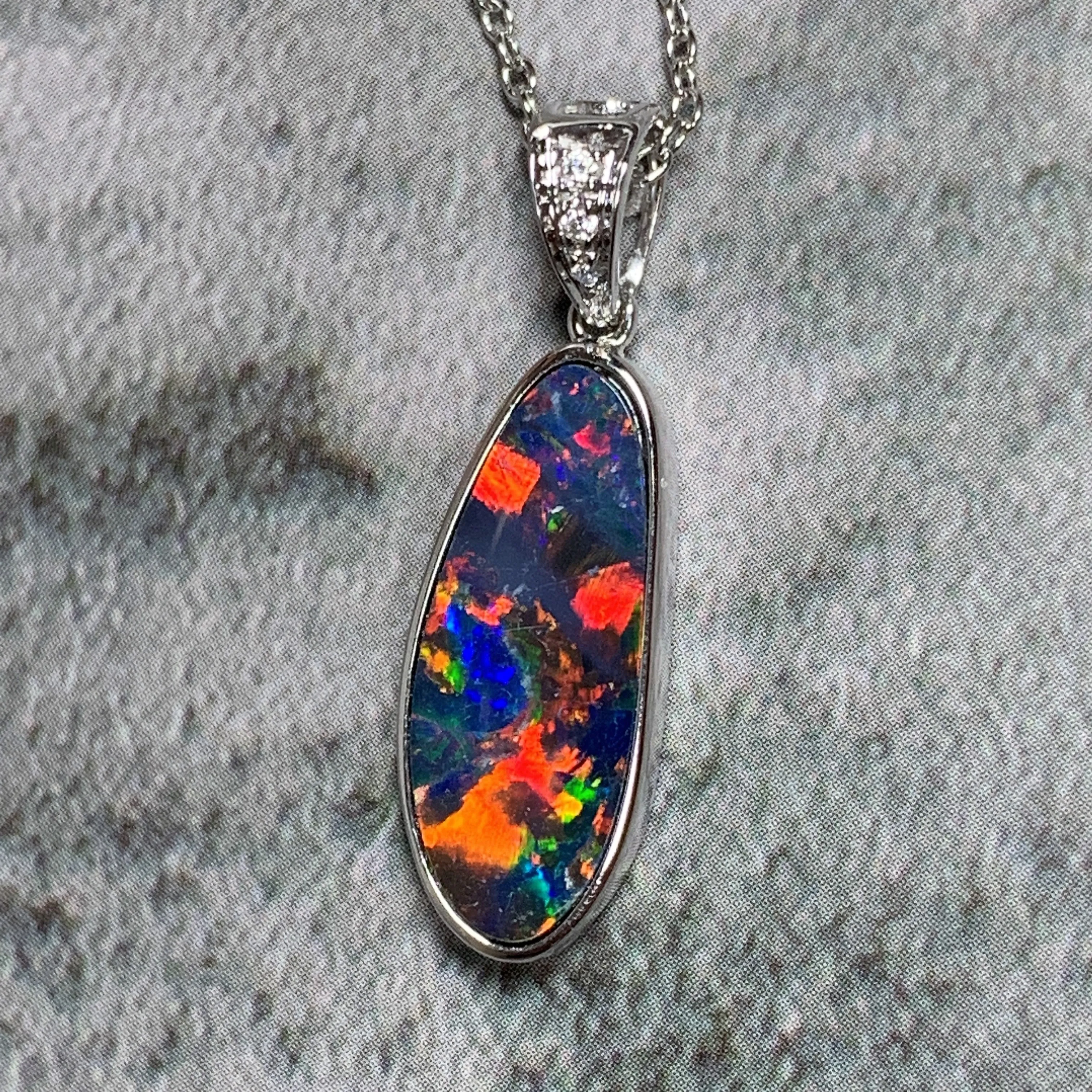 14kt White Gold Fire Opal 17.8x6.6mm and Diamond pendant