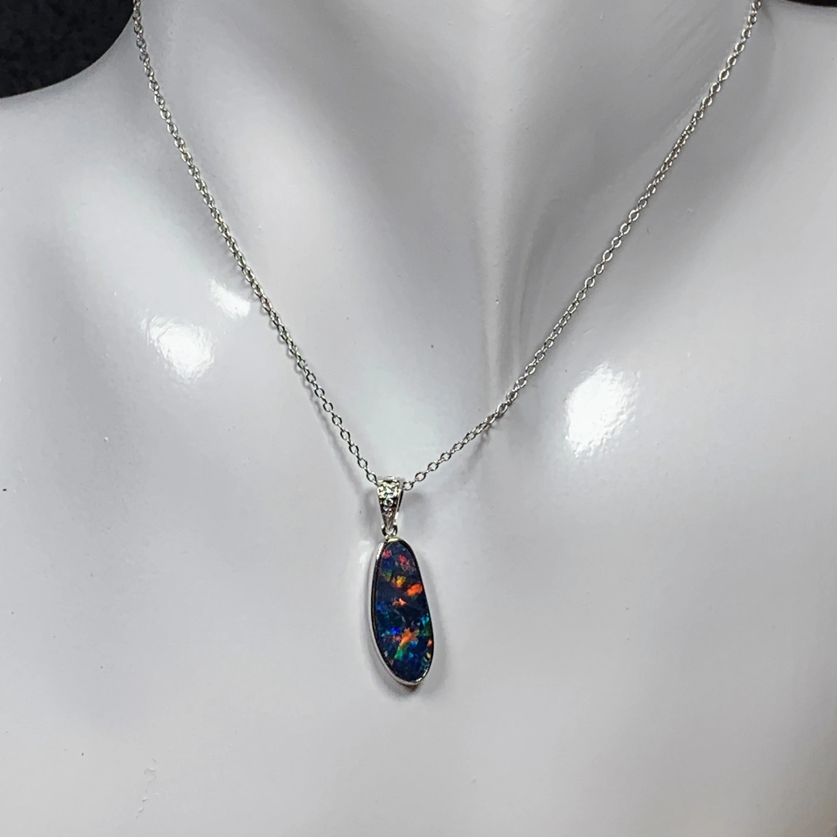 14kt White Gold Fire Opal 17.8x6.6mm and Diamond pendant