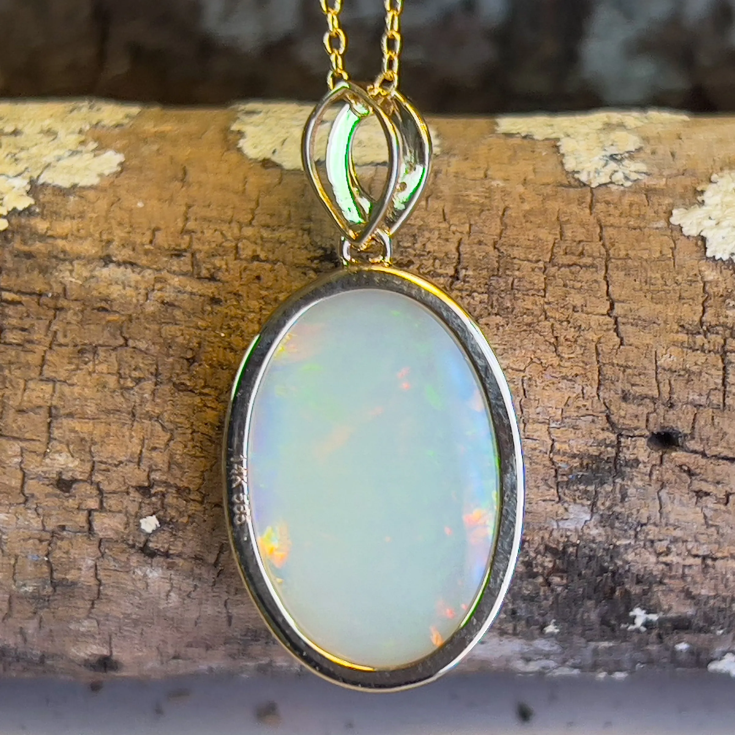 14kt Yellow Gold Large Opal 11.26ct oval shape pendant bezel set