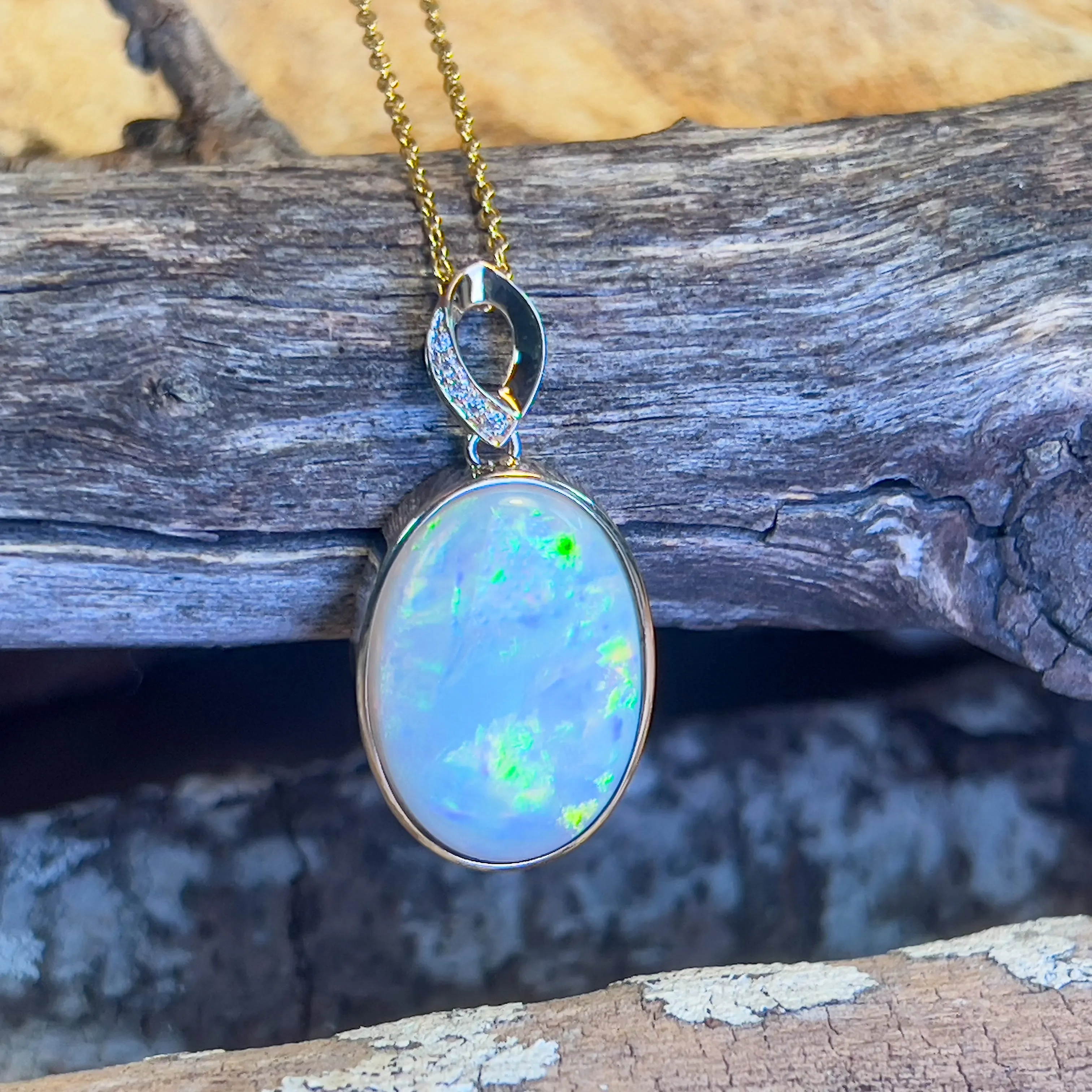 14kt Yellow Gold Large Opal 11.26ct oval shape pendant bezel set