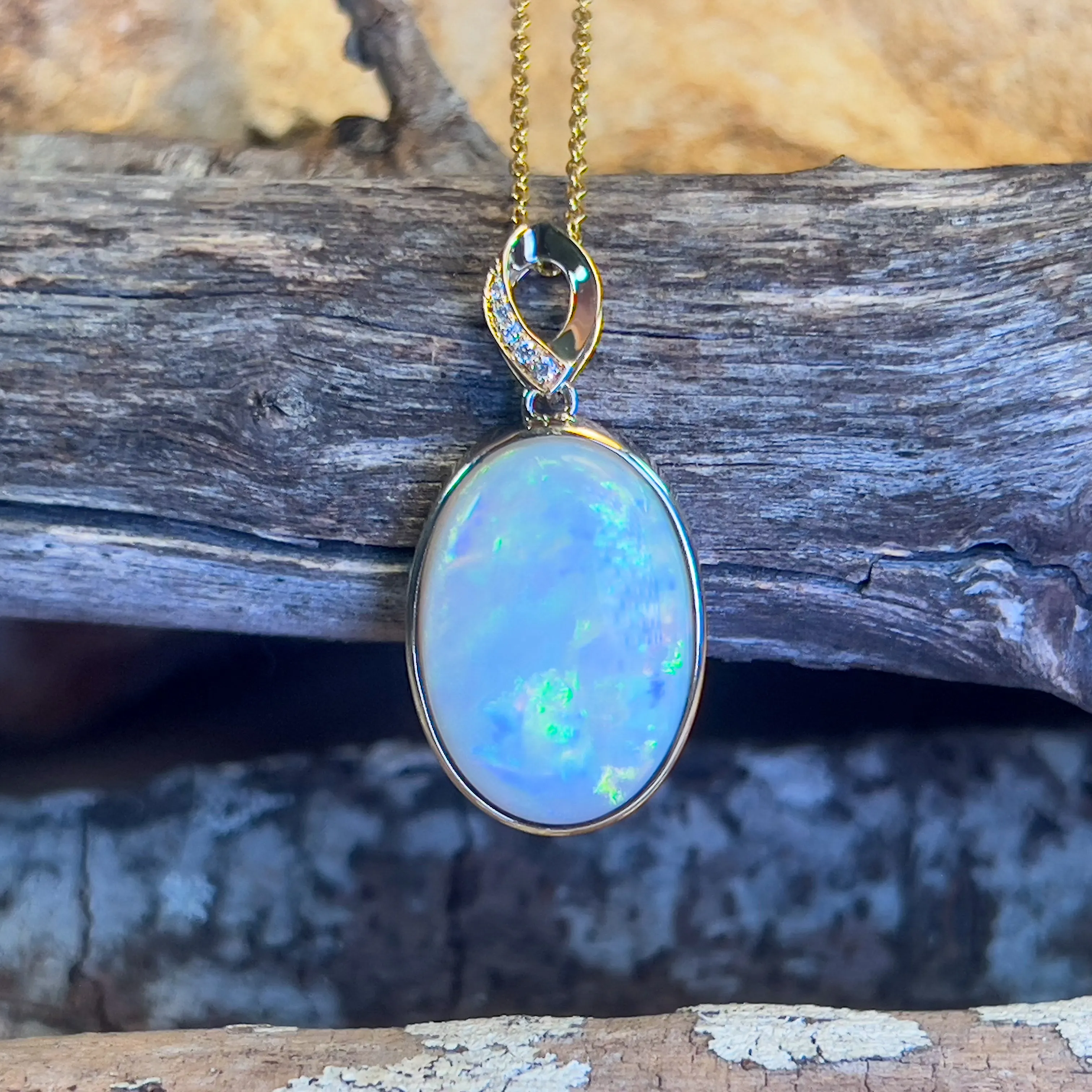 14kt Yellow Gold Large Opal 11.26ct oval shape pendant bezel set