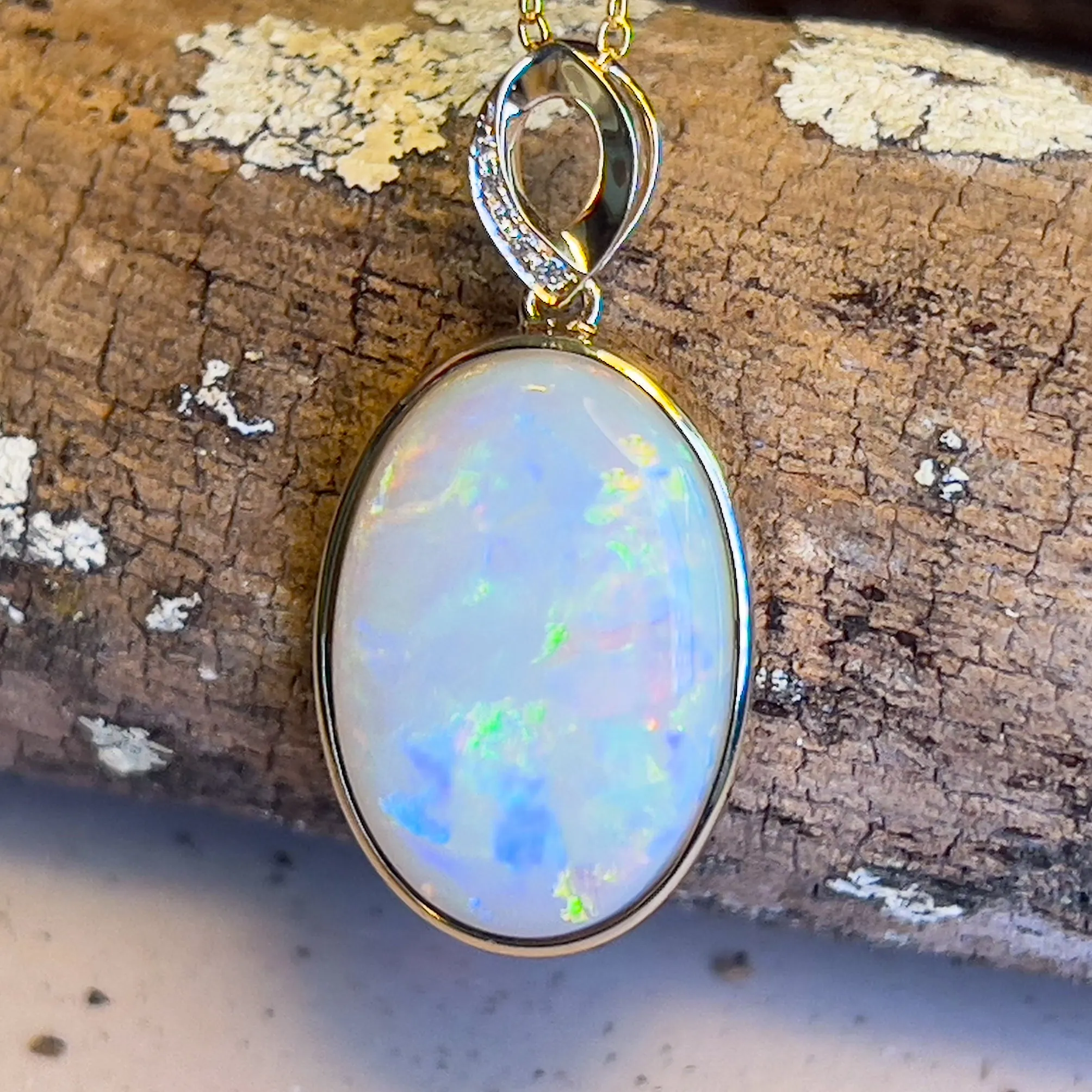 14kt Yellow Gold Large Opal 11.26ct oval shape pendant bezel set