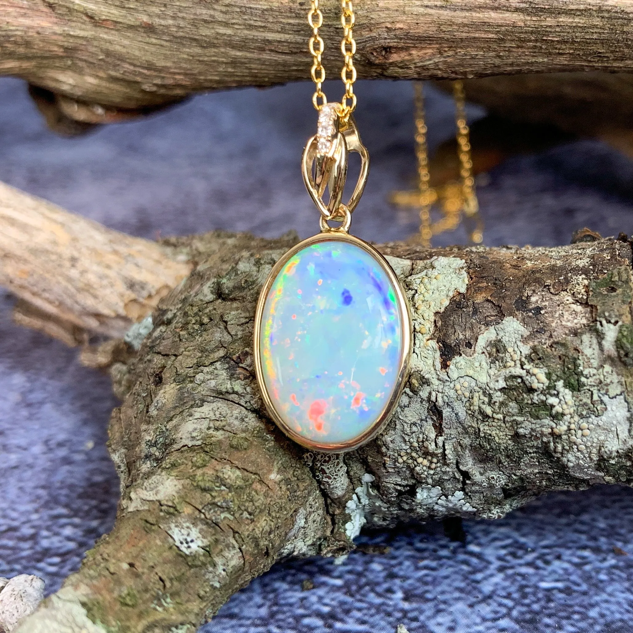 14kt Yellow Gold pendant White Opal and Diamond