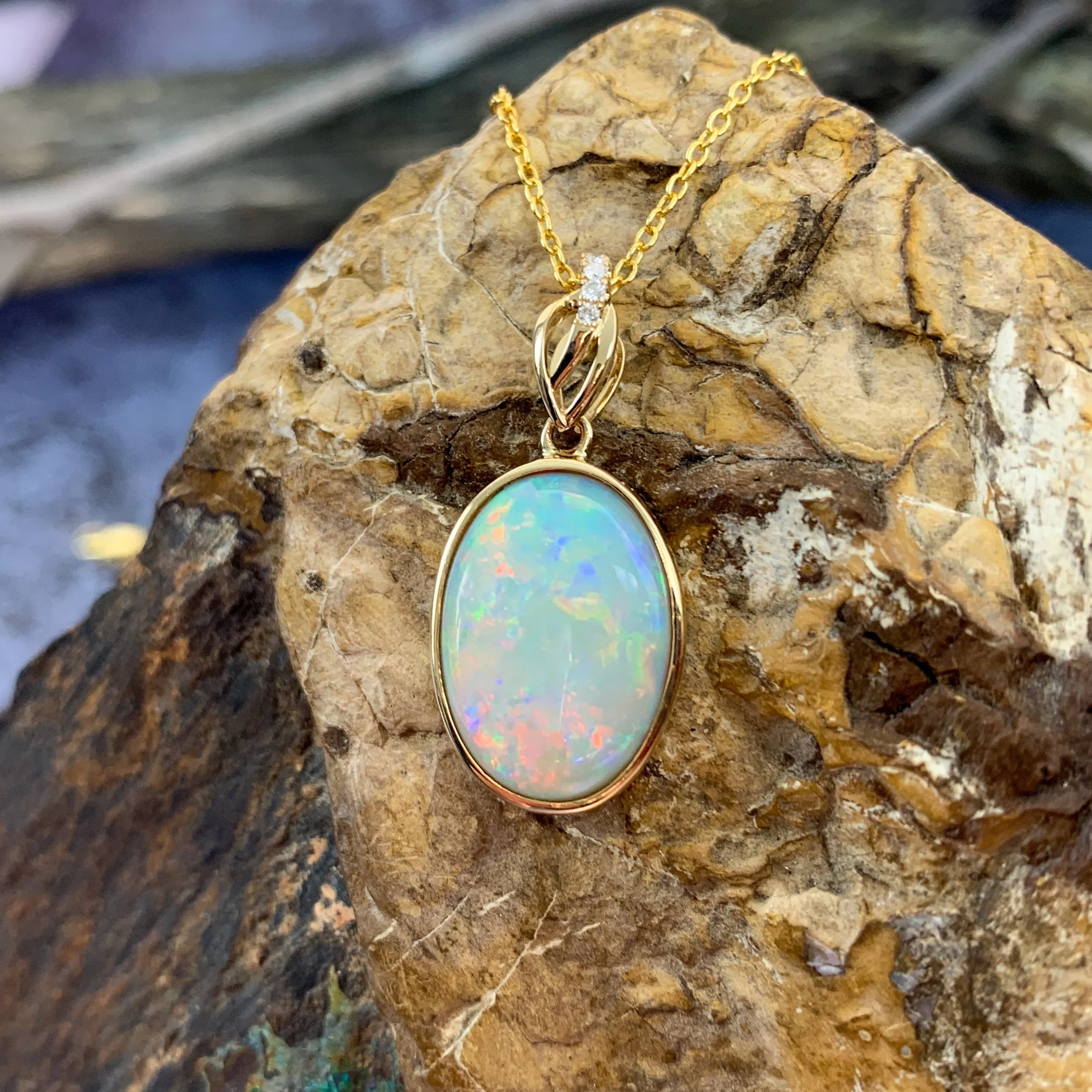 14kt Yellow Gold pendant White Opal and Diamond