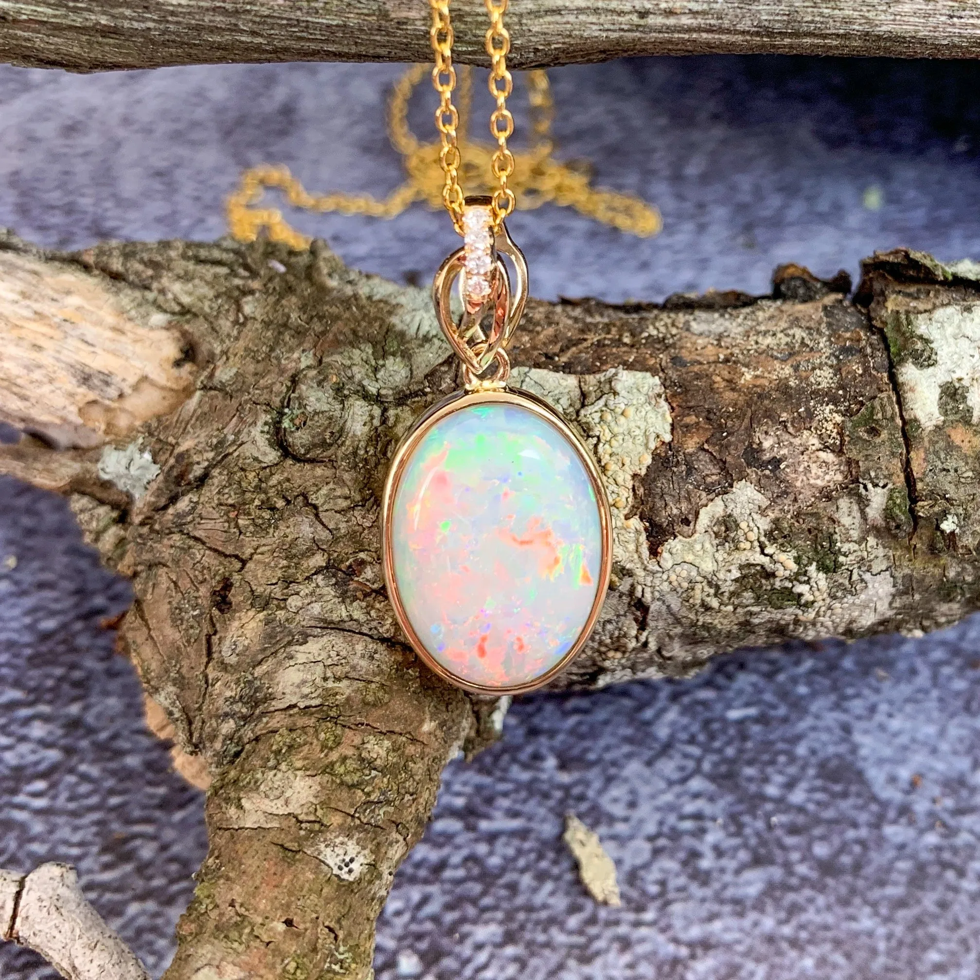 14kt Yellow Gold pendant White Opal and Diamond