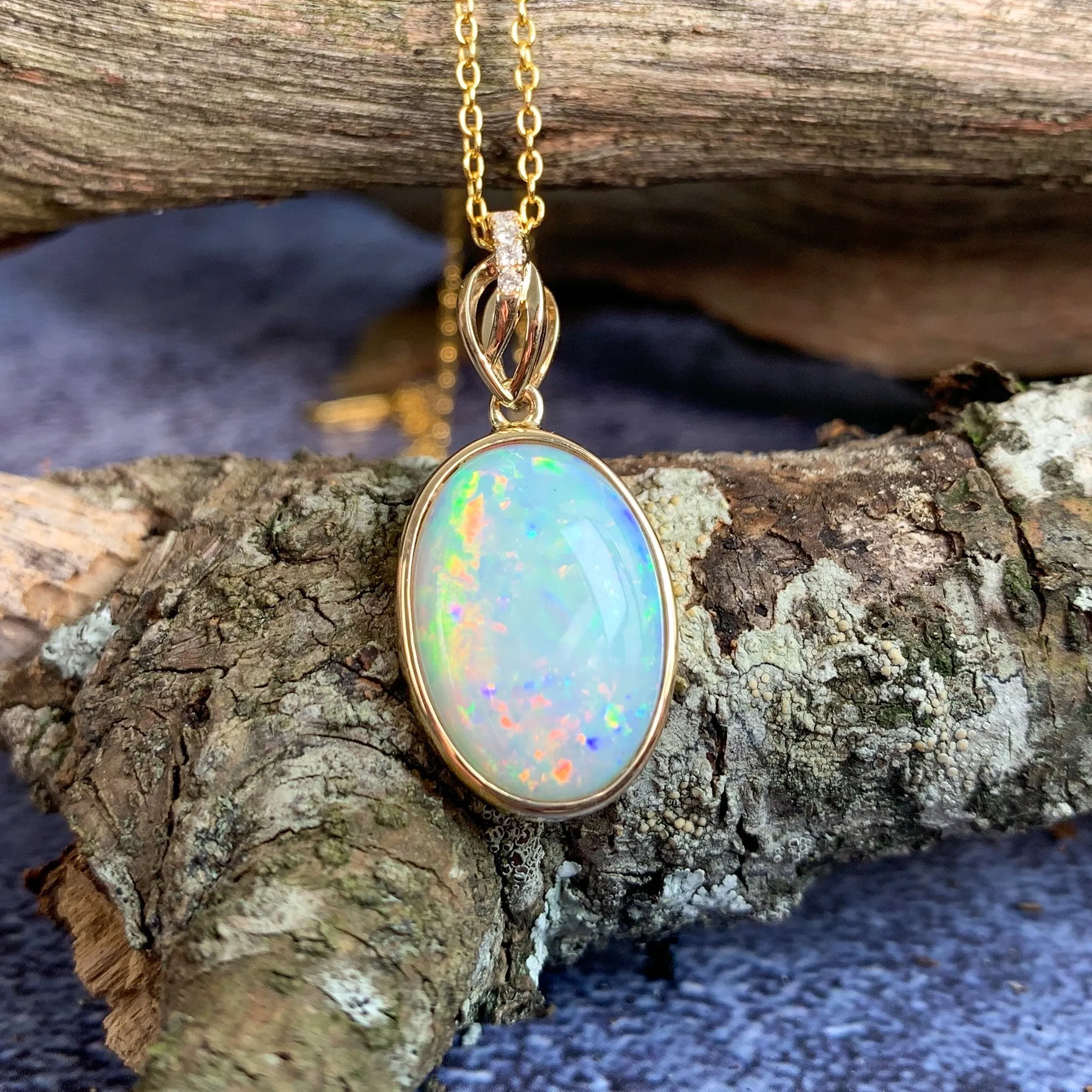 14kt Yellow Gold pendant White Opal and Diamond