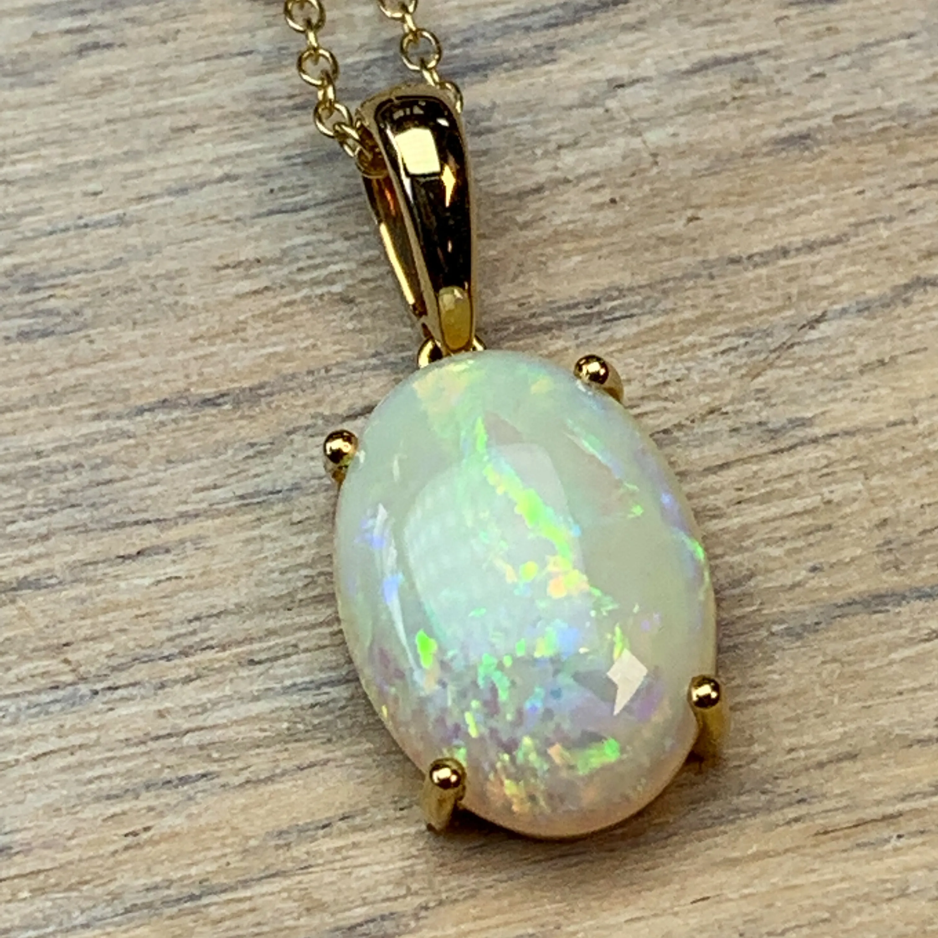 14kt Yellow Gold White Opal 13.7x10mm pendant