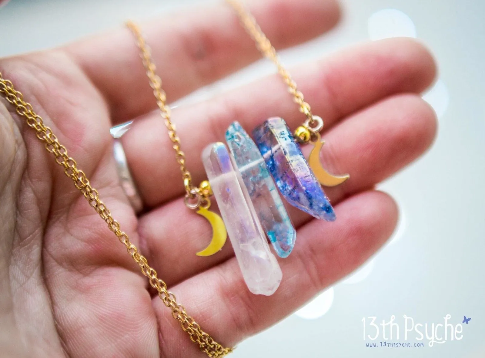 3 polished crystal quarz necklace with tiny moons