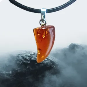 Amber Tooth Pendant with Silver Hanger