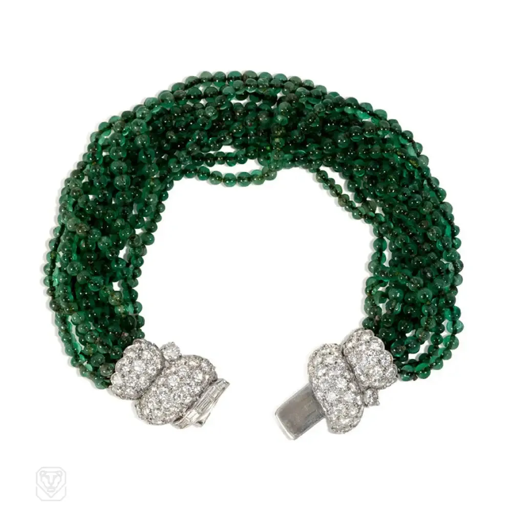 Art Deco diamond and emerald torsade bracelet