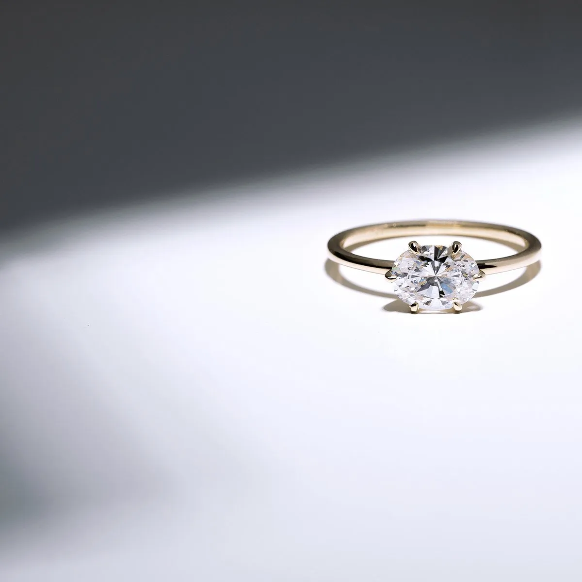 East-West Halo Diamond Engagement Ring