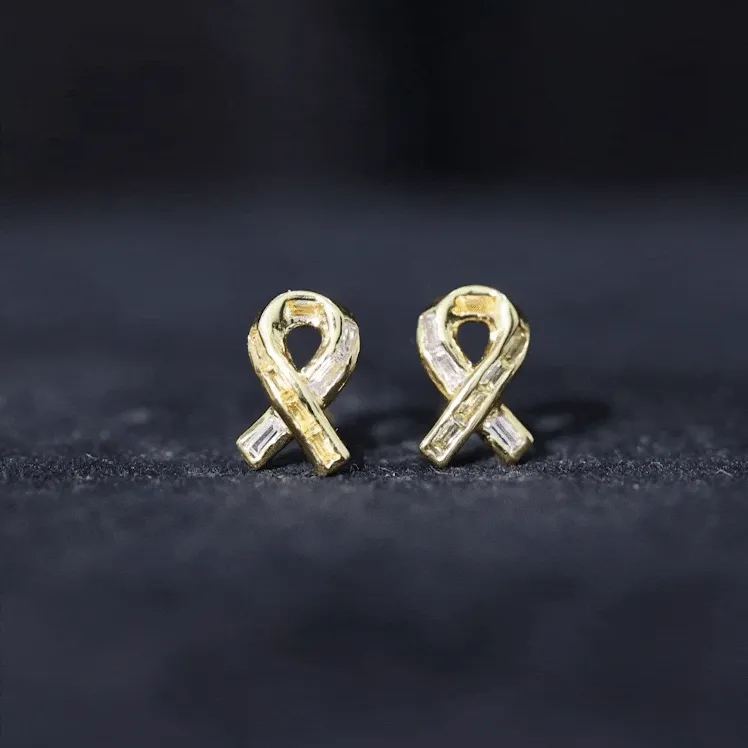 Lab Created Yellow Sapphire Knot Stud Earrings With Diamond