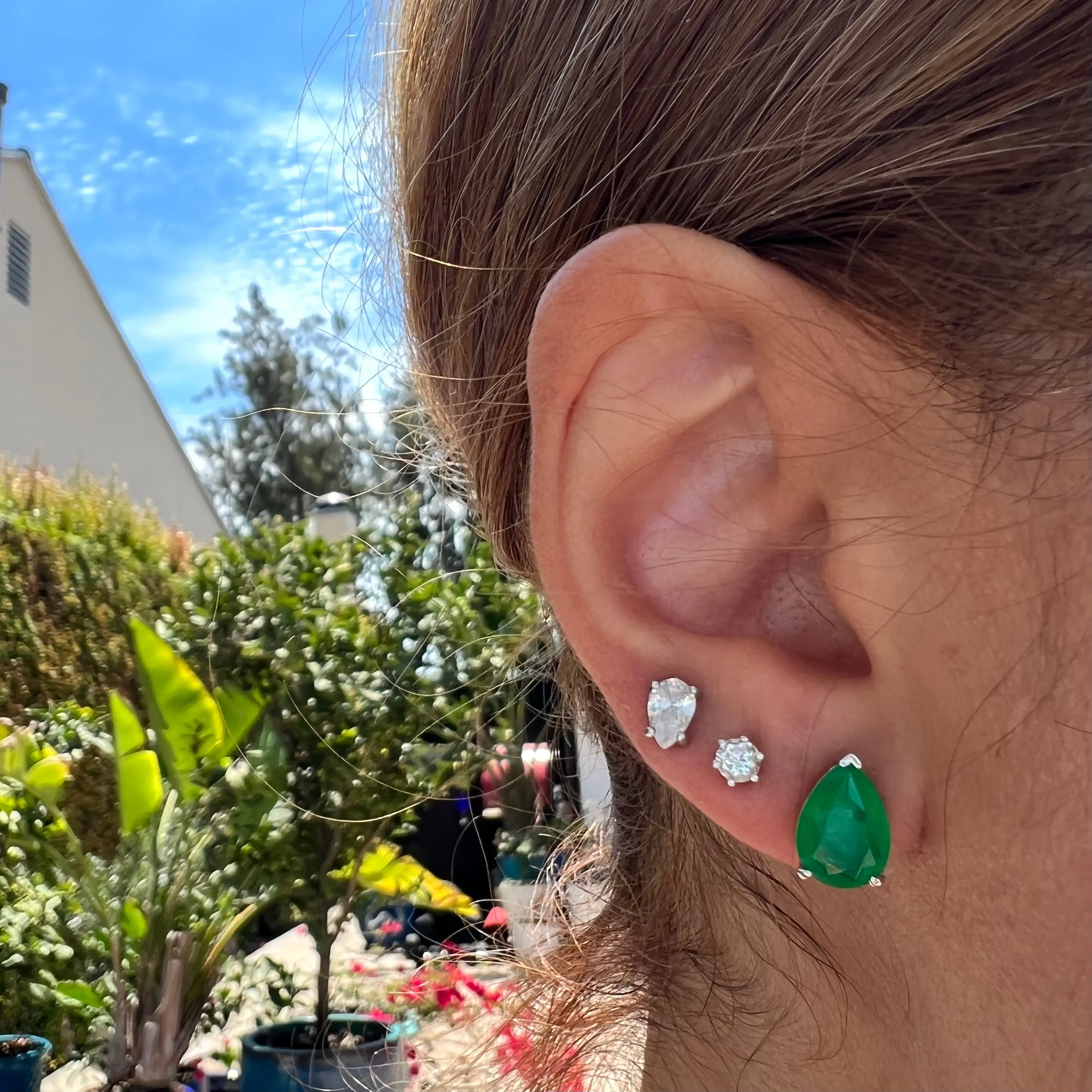 Sterling silver pear emerald stud earrings